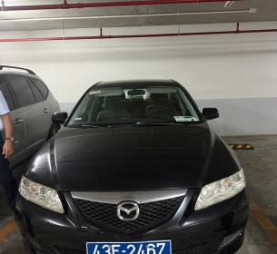 Xe ô tô con đã qua sử dụng, nhãn hiệu Mazda, loại 6, số sàn, 05 chỗ, sản xuất năm 2005, xuất xứ Việt Nam, biển đăng ký số 43E-2467